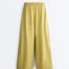 100% linnen broek met wijde pijpen en plooien aan de zijkant