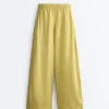 100% linnen broek met wijde pijpen en plooien aan de zijkant