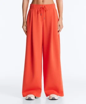 Broek met wijde pijpen en plooien van piquékatoen