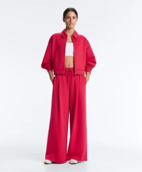 Broek met wijde pijpen, piqué en plooien, met katoen Broek met wijde pijpen, piqué en plooien, met katoen