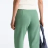 Capri-broek van piqué met katoenen riemlussen