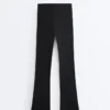 Hoge Compressive Broek met uitlopende pijpen Hoge Compressive Broek met uitlopende pijpen