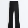 Hoge Compressive Broek met uitlopende pijpen Hoge Compressive Broek met uitlopende pijpen