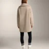 Lang jasje van imitatieschapenvacht Lang jasje van imitatieschapenvacht